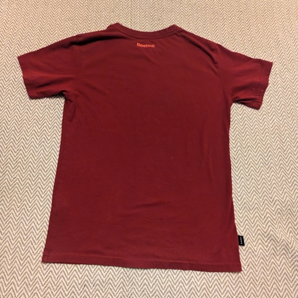 🛍️4 For $15🛍️Reebok Kids Burgundy Tee with Orange Accents - Picture 2 of 8